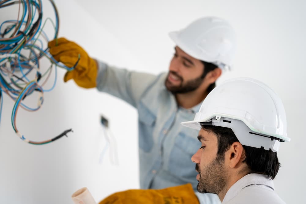 electrician-mounting-wiring-for-electric-sockets-o-2025-01-08-02-40-10-utc-1.jpg